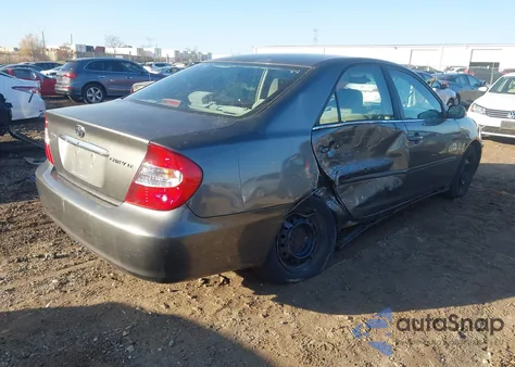 2003 Toyota Camry Le z USA, uszkodzony, nr VIN 4T1BE32K13U744807